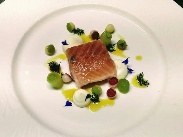 Butter poached Loch Duart salmon, salted crème fraîche, compressed cucumber, pickled apple and radish and dill oil